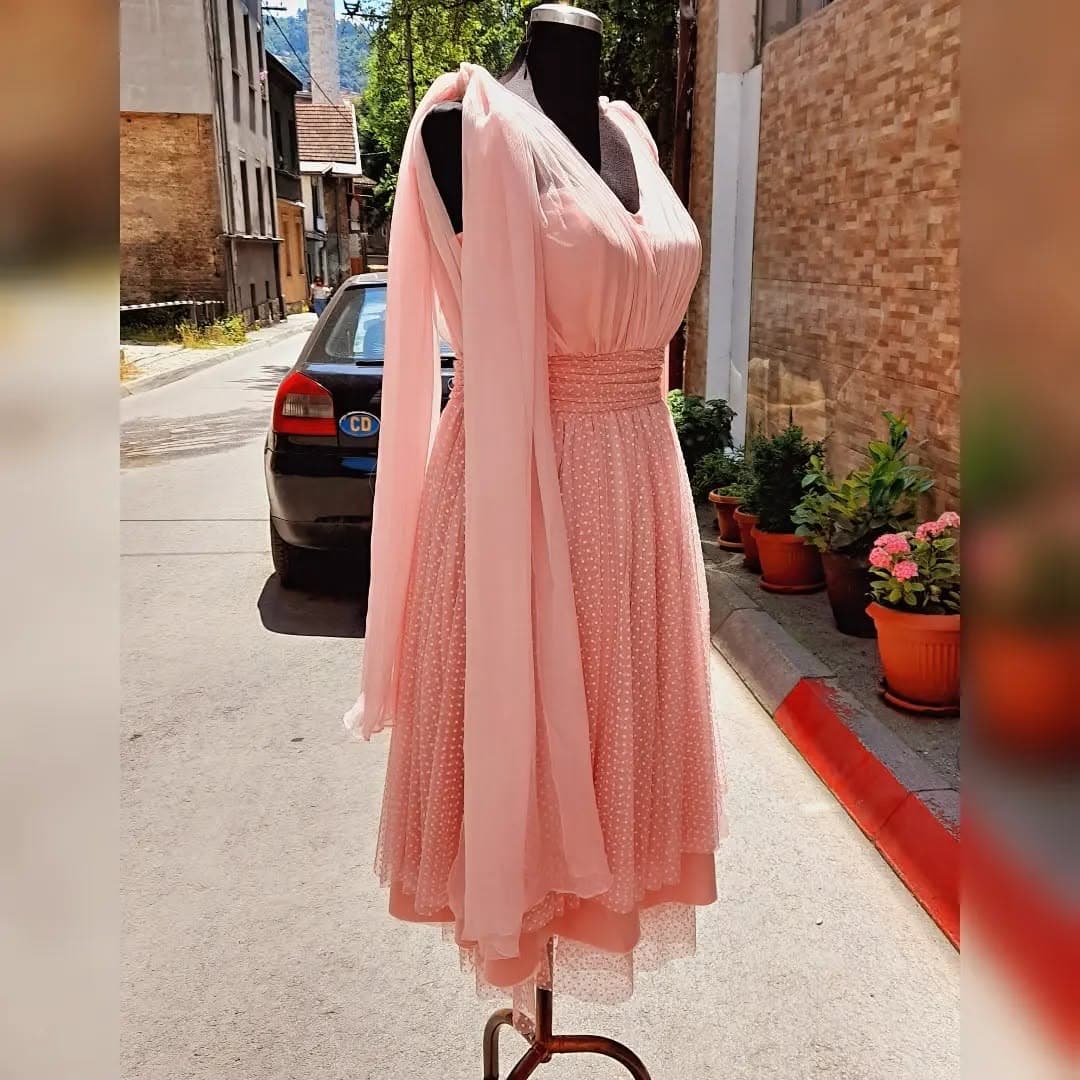 The front of a classic custom dress made by a MadeApt artisan