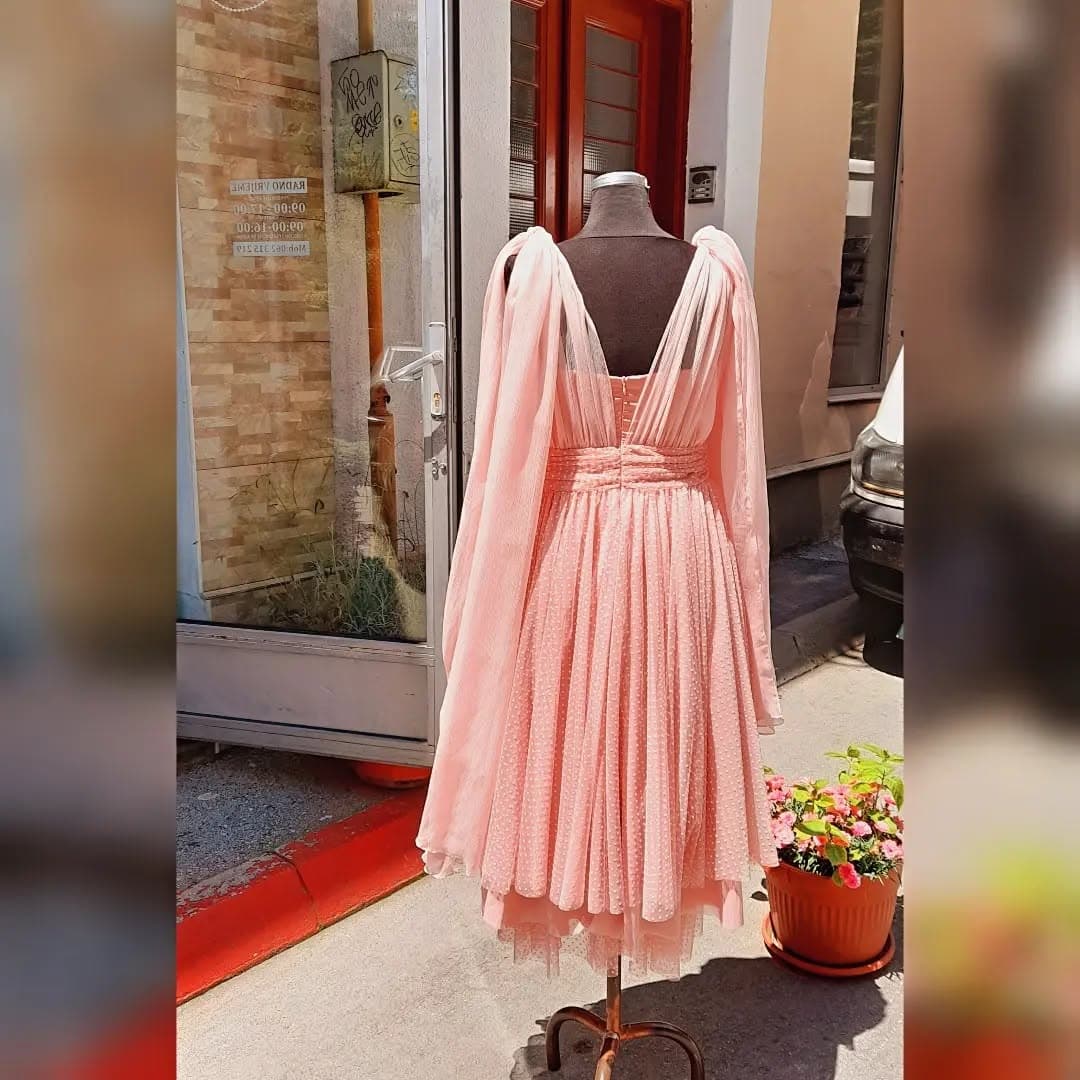 A classic custom dress, designed online and made to measure
