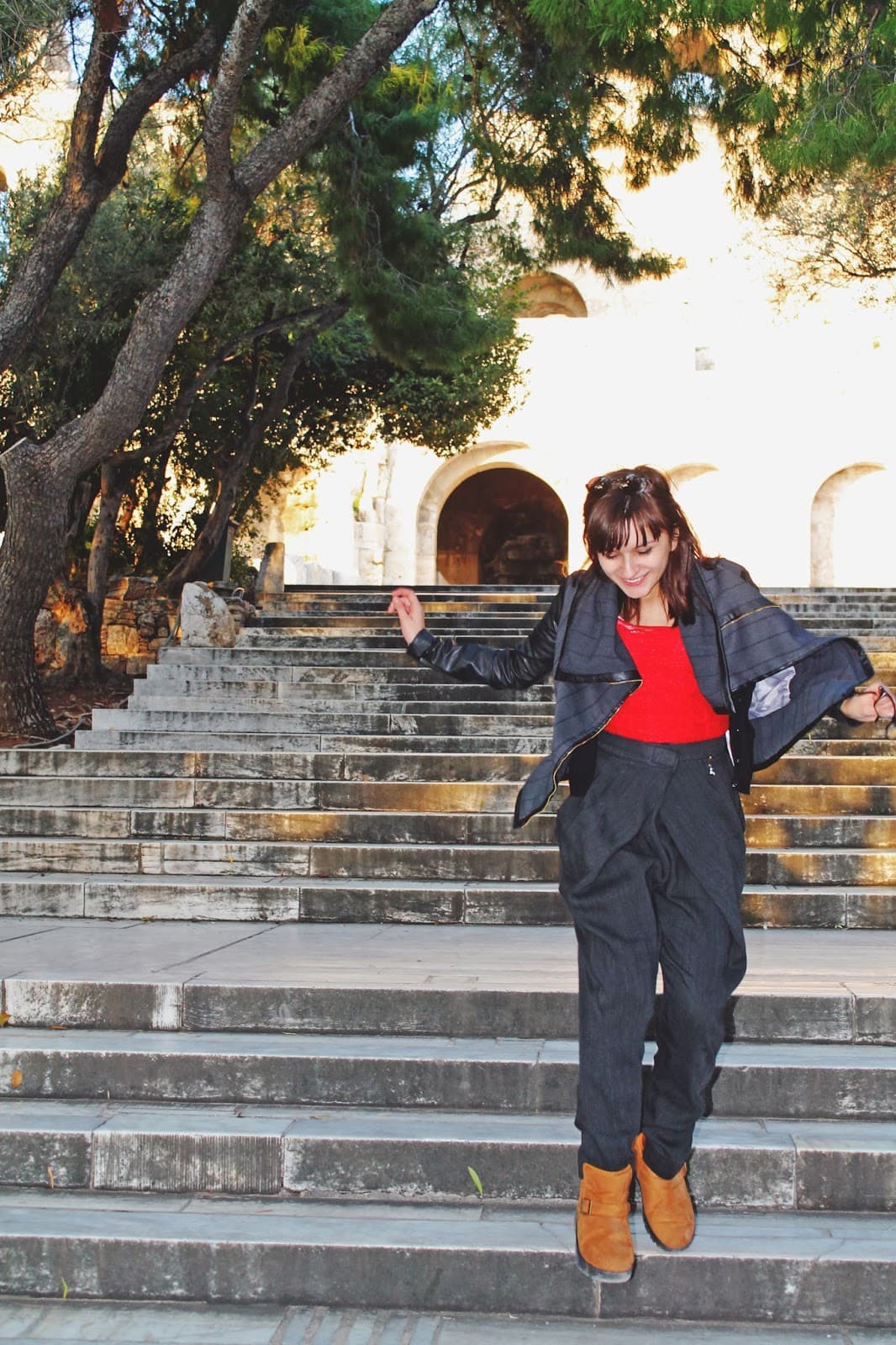 Custom made draped black pants worn on a real body — made to measure, not a size chart