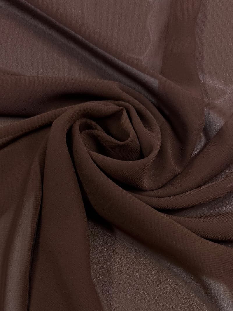 A custom made full-length chiffon bridesmaid gown in chocolate brown