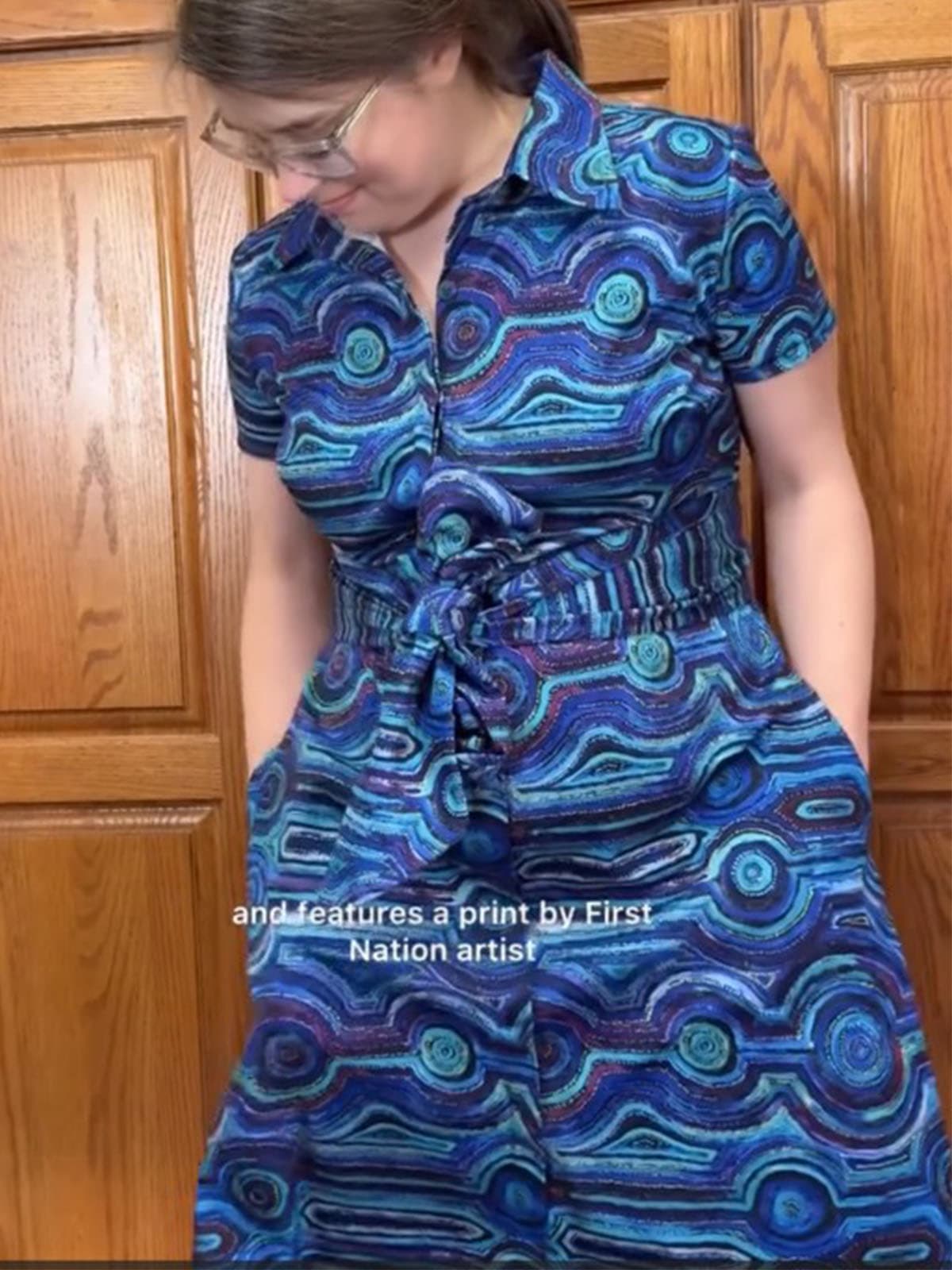 The finished custom shirt dress, sewn to measure and worn by the customer
