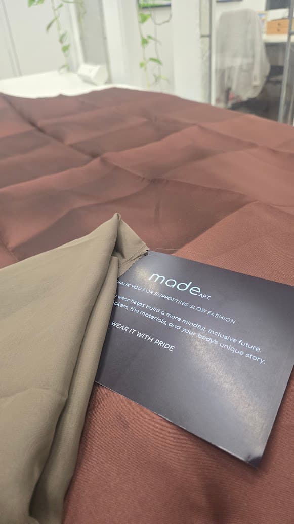 Fabric options compared in natural light for a custom dress made from a reference picture