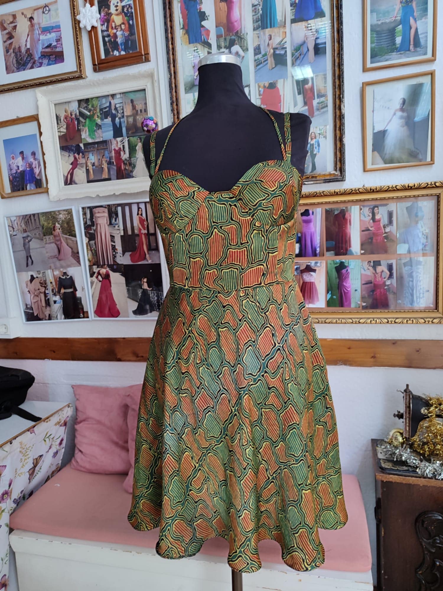 A modern custom-made green silk evening dress