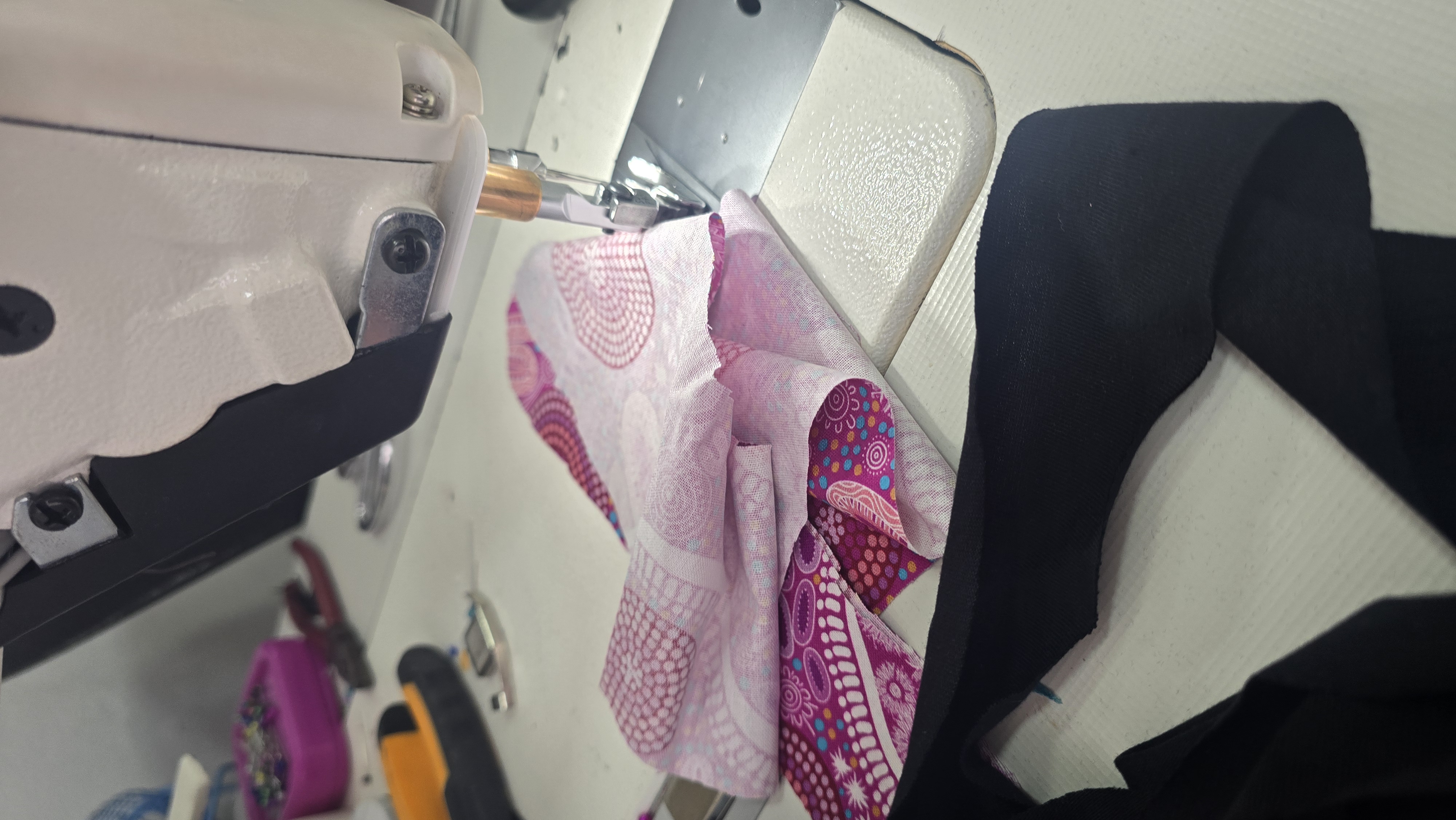 Fabric under the needle of an industrial sewing machine